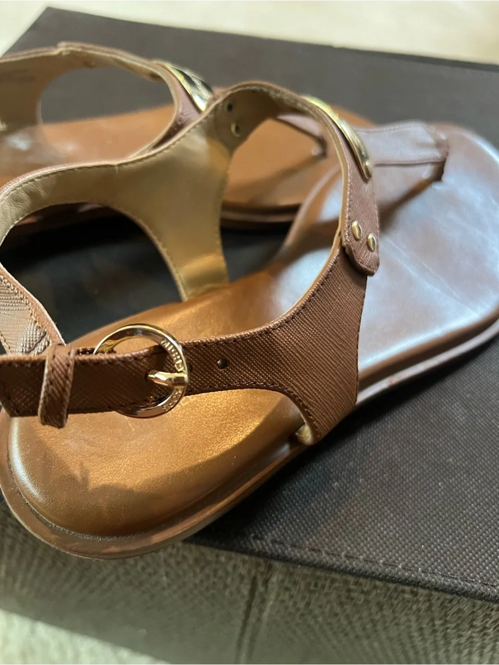 Michael Kors Brown Leather T-Strap Sandals with Gold Logo Plaque